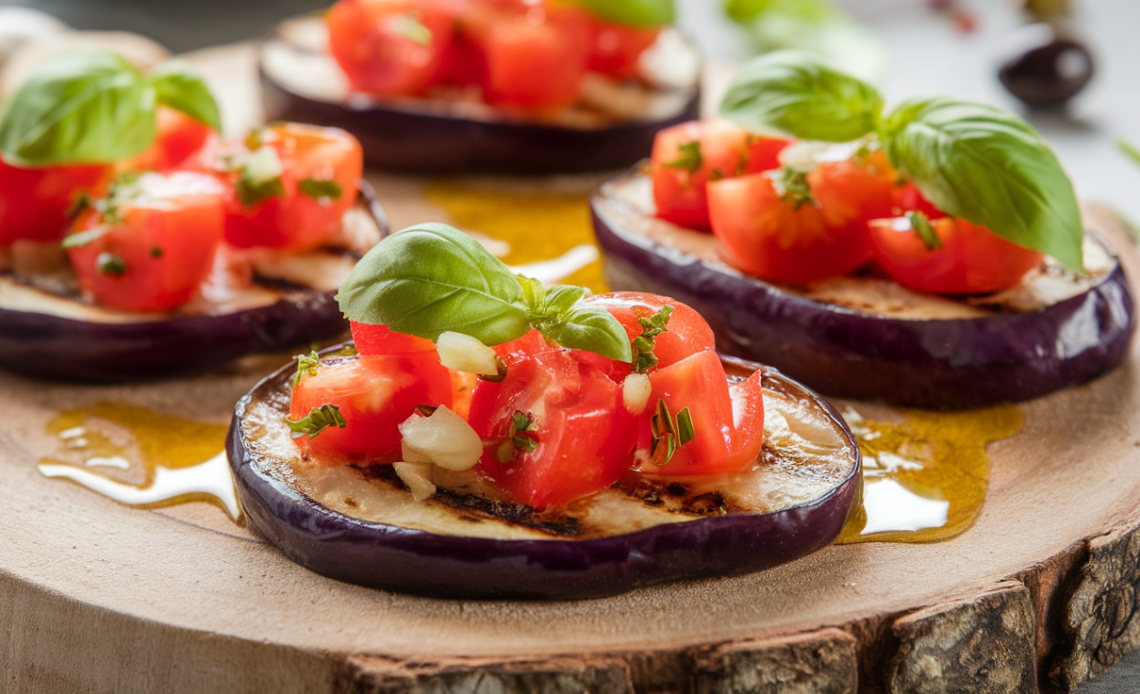 Low carb eggplant bruschetta topped with diced tomatoes, fresh basil, and melted cheese on grilled eggplant slices.