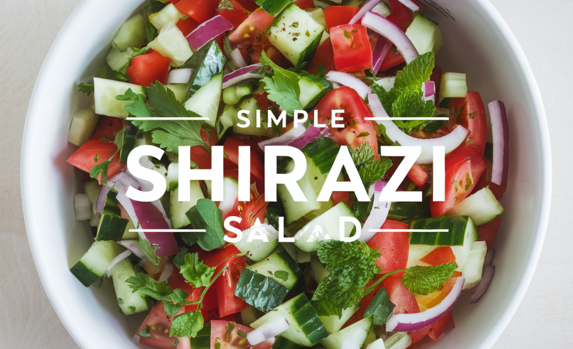 Fresh Shirazi salad with diced cucumbers, tomatoes, onions, and herbs in a clear bowl